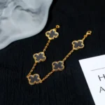 CLOVER 5 MOTIF ROCK CRYSTAL BRACELET