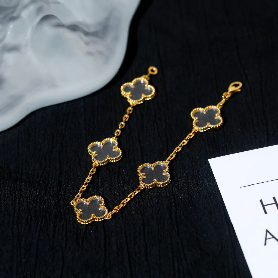 IMG_0687_701b0f75-563f-42b9-9092-12dfbda0e4e8 CLOVER 5 MOTIF ROCK CRYSTAL BRACELET - Image 1